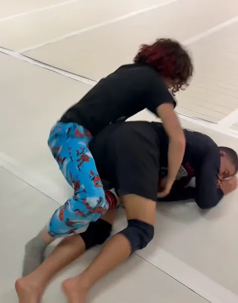 Nathan Johnson in a grappling round on the mats